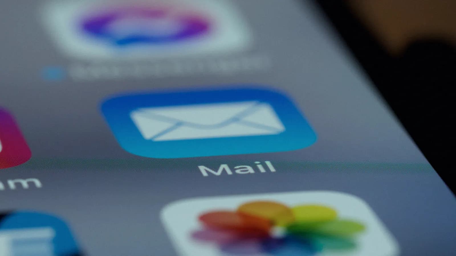 Close-up of the Mail app icon on a phone's home screen.