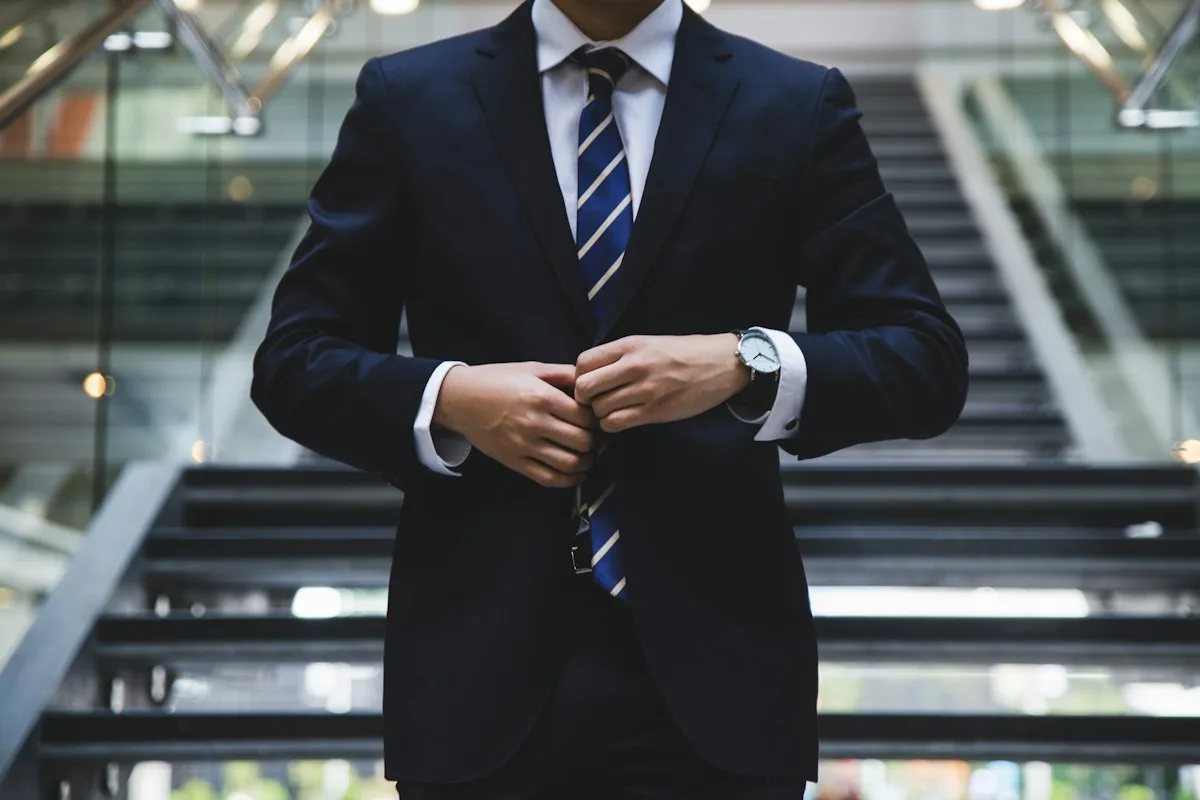 A business director reviewing business expense records and invoices.