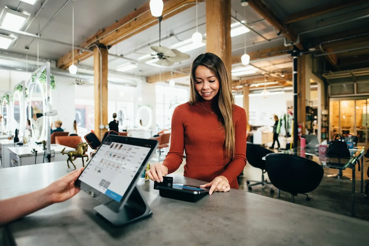 A point-of-sale payment terminal printing a detailed till receipt.